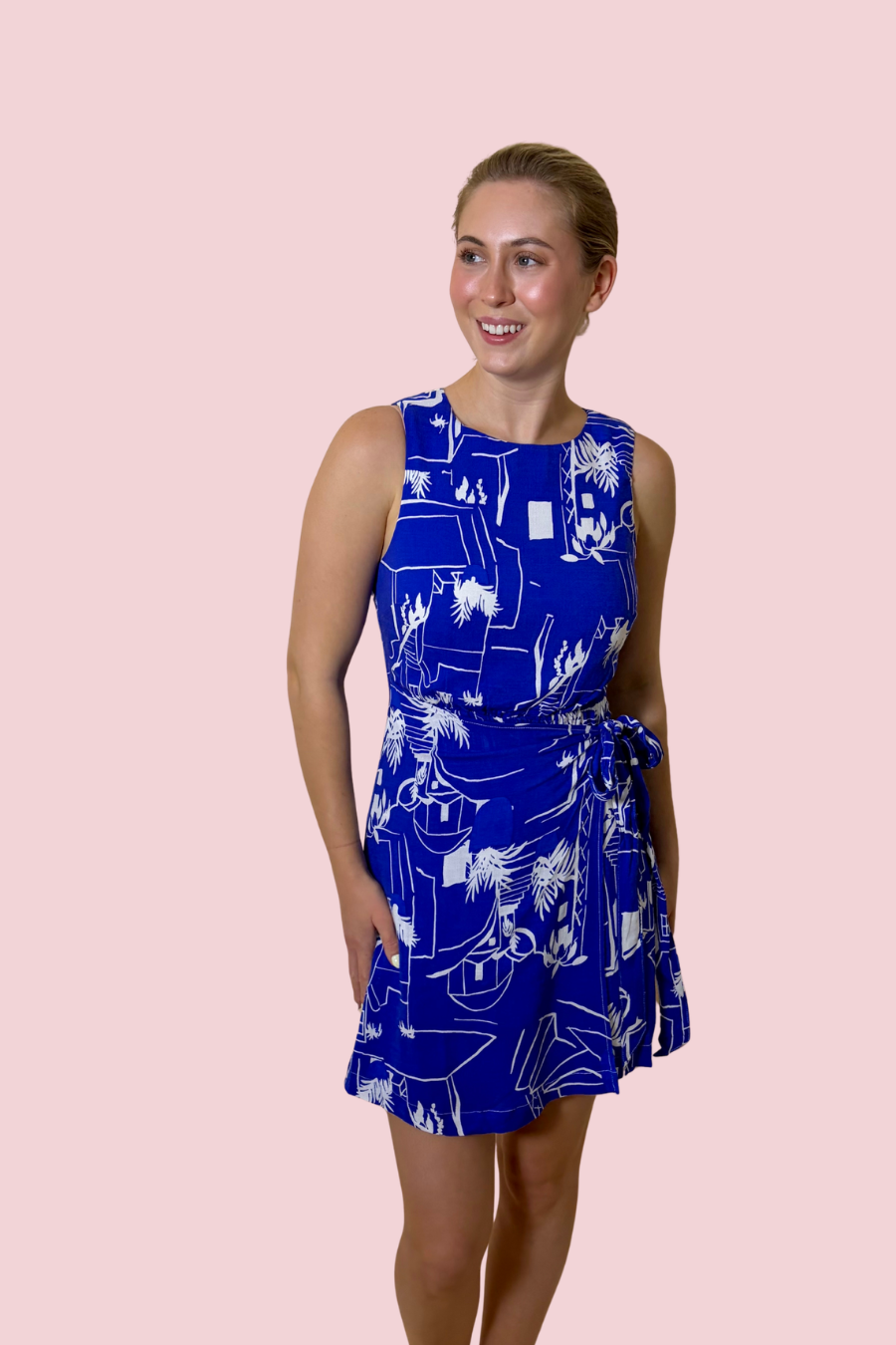 Take Me Somewhere Blue Resort Print Wrap Mini Dress with Adjustable Side Tie
