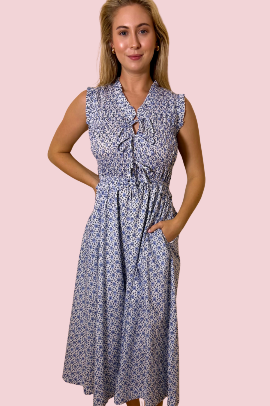 Something About Her Blue and White Floral Midi Dress with Sleeveless Design and A-Line Skirt
