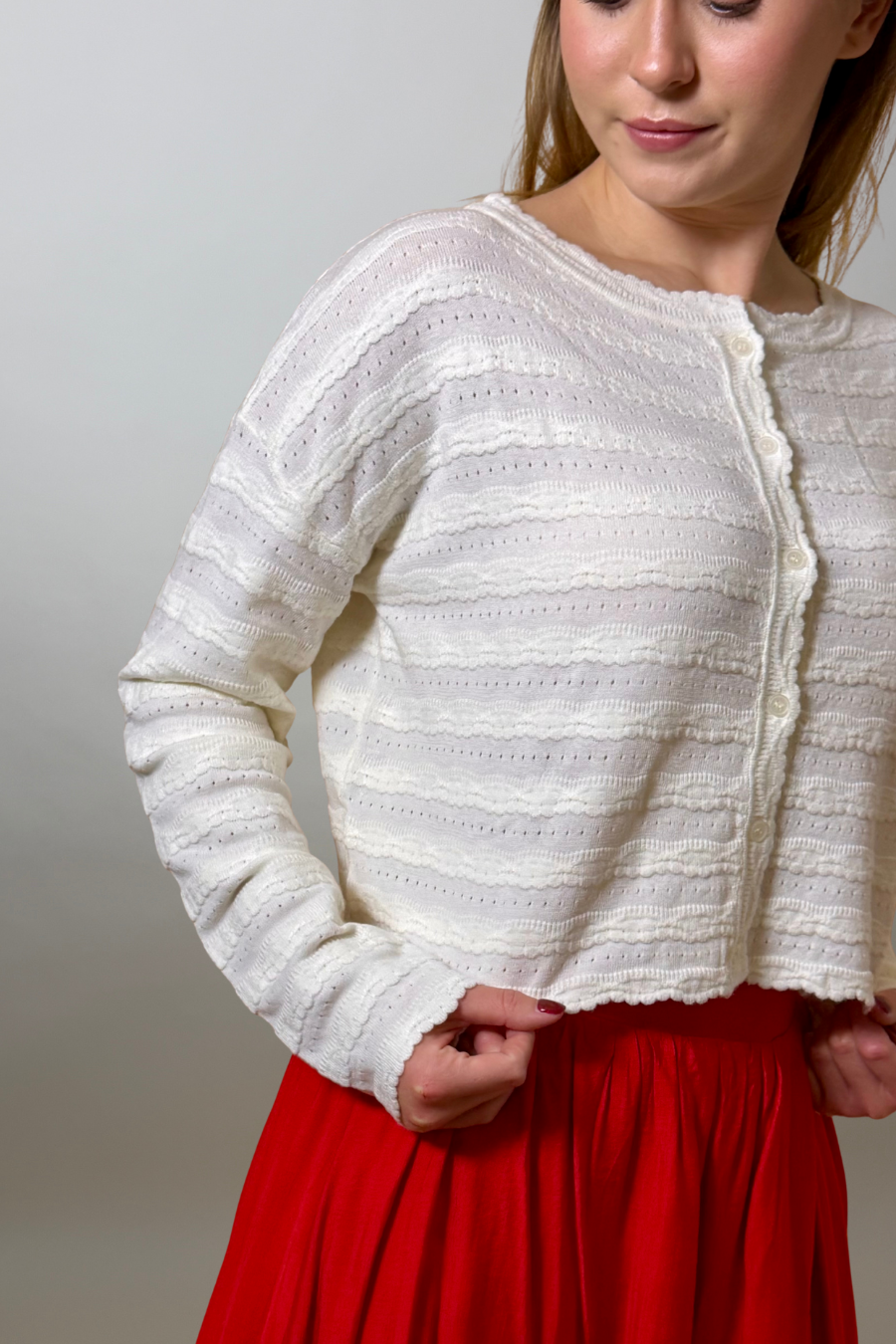 Swooning Over Her Cardigan