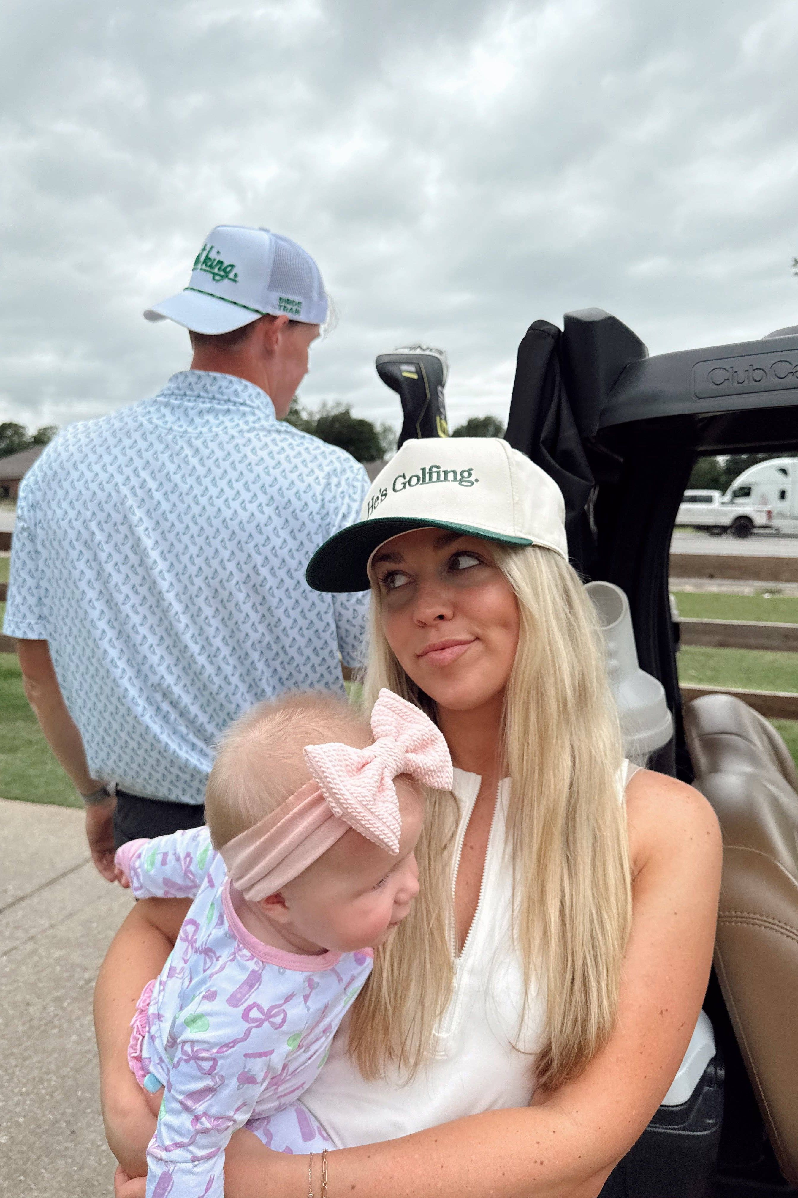 He's Golfing - Green Vintage Trucker Hat