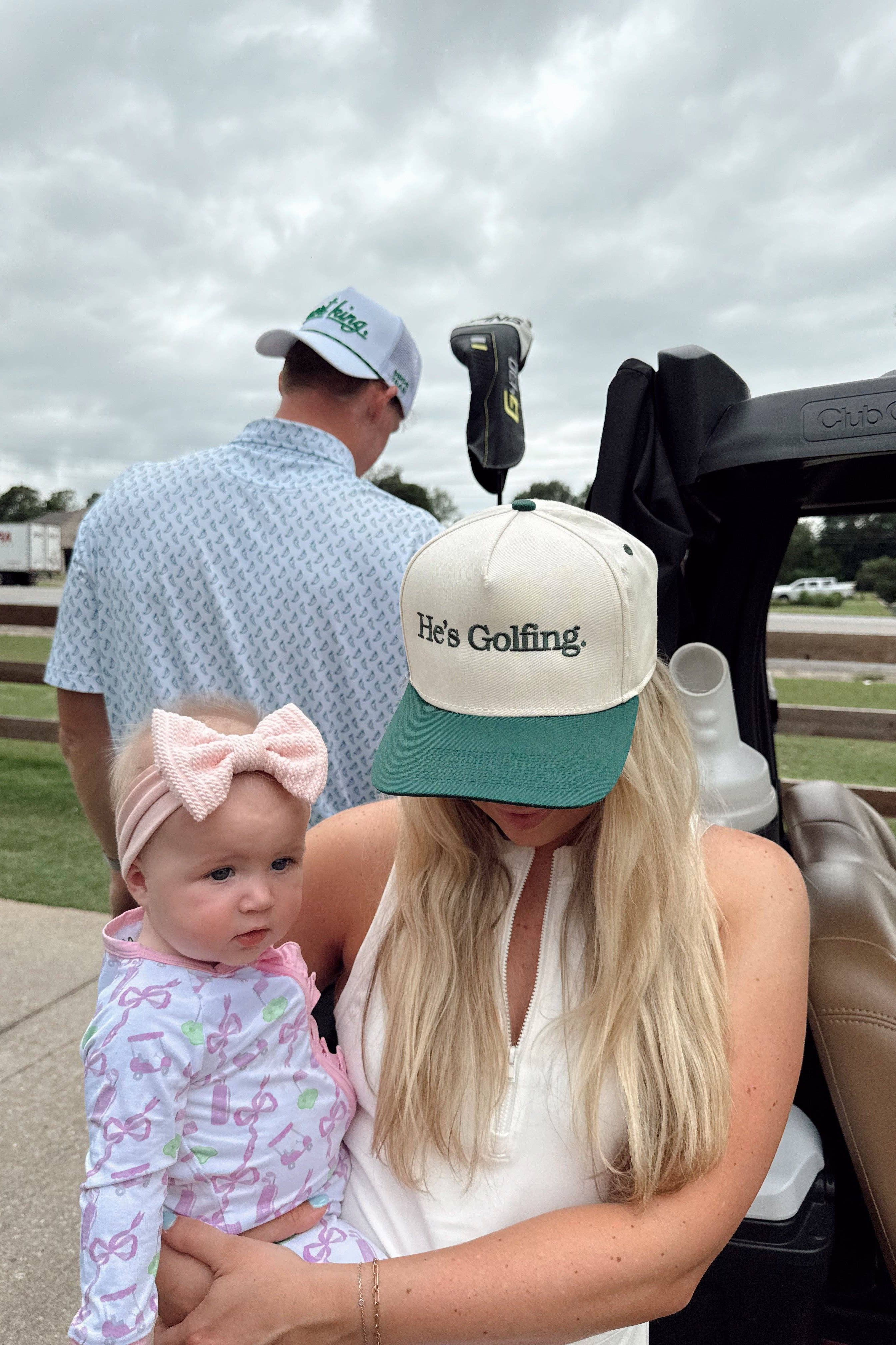 He's Golfing - Green Vintage Trucker Hat