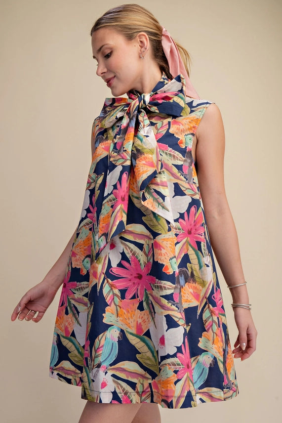 Paradise Found Tropical Print Swing Dress with Bow Neck Detail and Pockets
