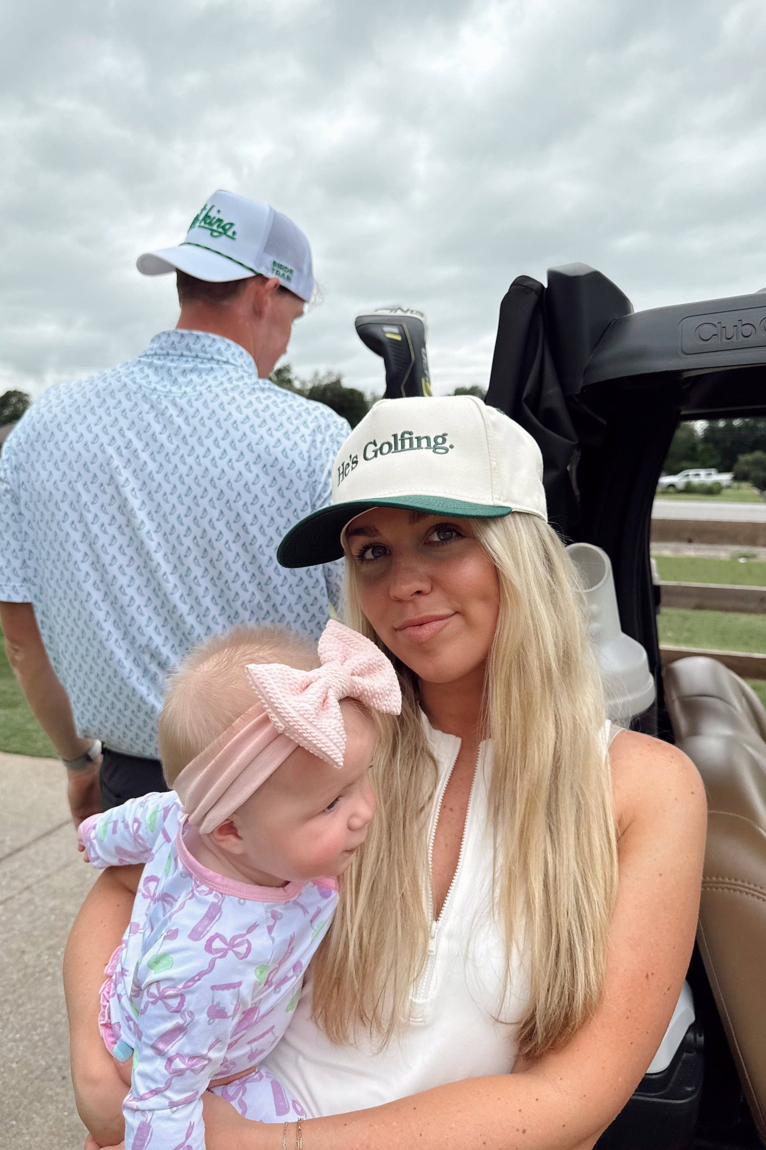 He's Golfing - Green Vintage Trucker Hat